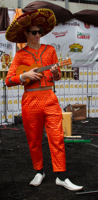 The Mariacheese aka Reverend Nick Alexander plays his cheese song for the crowd at the Last Grilled Cheese Invitational at the Los Angeles Center Studios on Saturday April 12, 2014.  